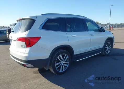 2018 Honda Pilot Touring z USA, uszkodzony, nr VIN 5FNYF6H91JB008621